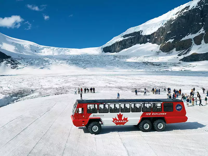 Journey through the Canadian Rockies Rail & Road Trip | Columbia Icefield Snowcoach