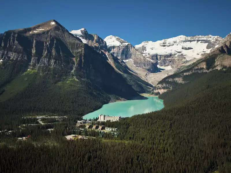 Majestic Canada Rail Vacation through the Rockies | Fairmont Chateau Lake Louise with Victoria Glacier